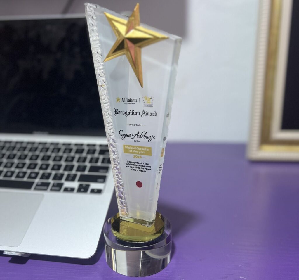 Digital Marketer of The Year alltalentz | Segun Adebanjo written on a plaque of award